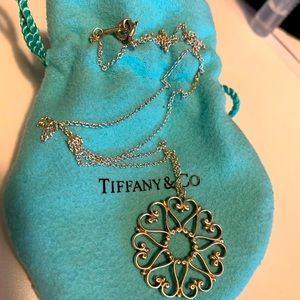 Tiffany & Co pendant on 18 inch chain. 925 sterling silver.
